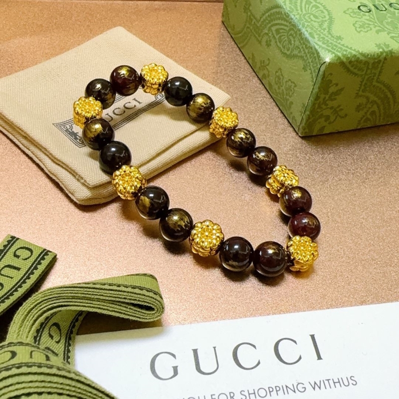 G*u*i bracelets